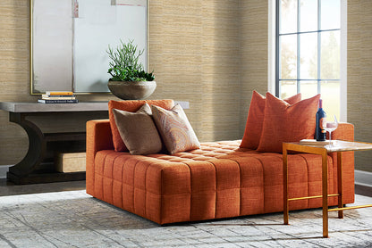 Orange sofa with decorative pillows in a living room setting with wall decorated Beige Weave Grasscloth Effect Peel & Stick Casa Mia Wallcovering.
