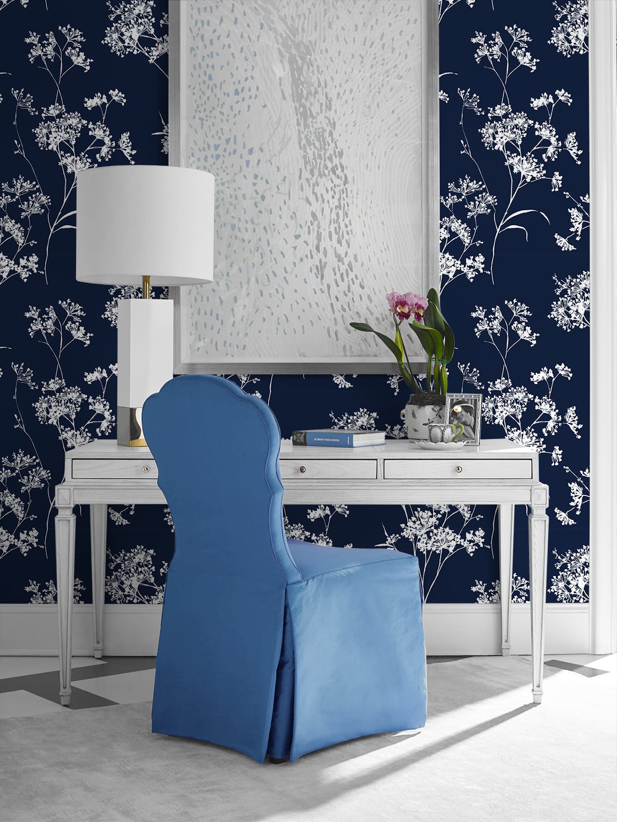 Blue chair in front of a white desk against wall decorated with Blue Soft Scent Floral Peel & Stick Casa Mia Wallcovering.