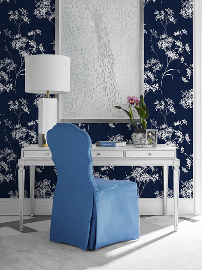Blue chair in front of a white desk against wall decorated with Blue Soft Scent Floral Peel & Stick Casa Mia Wallcovering.