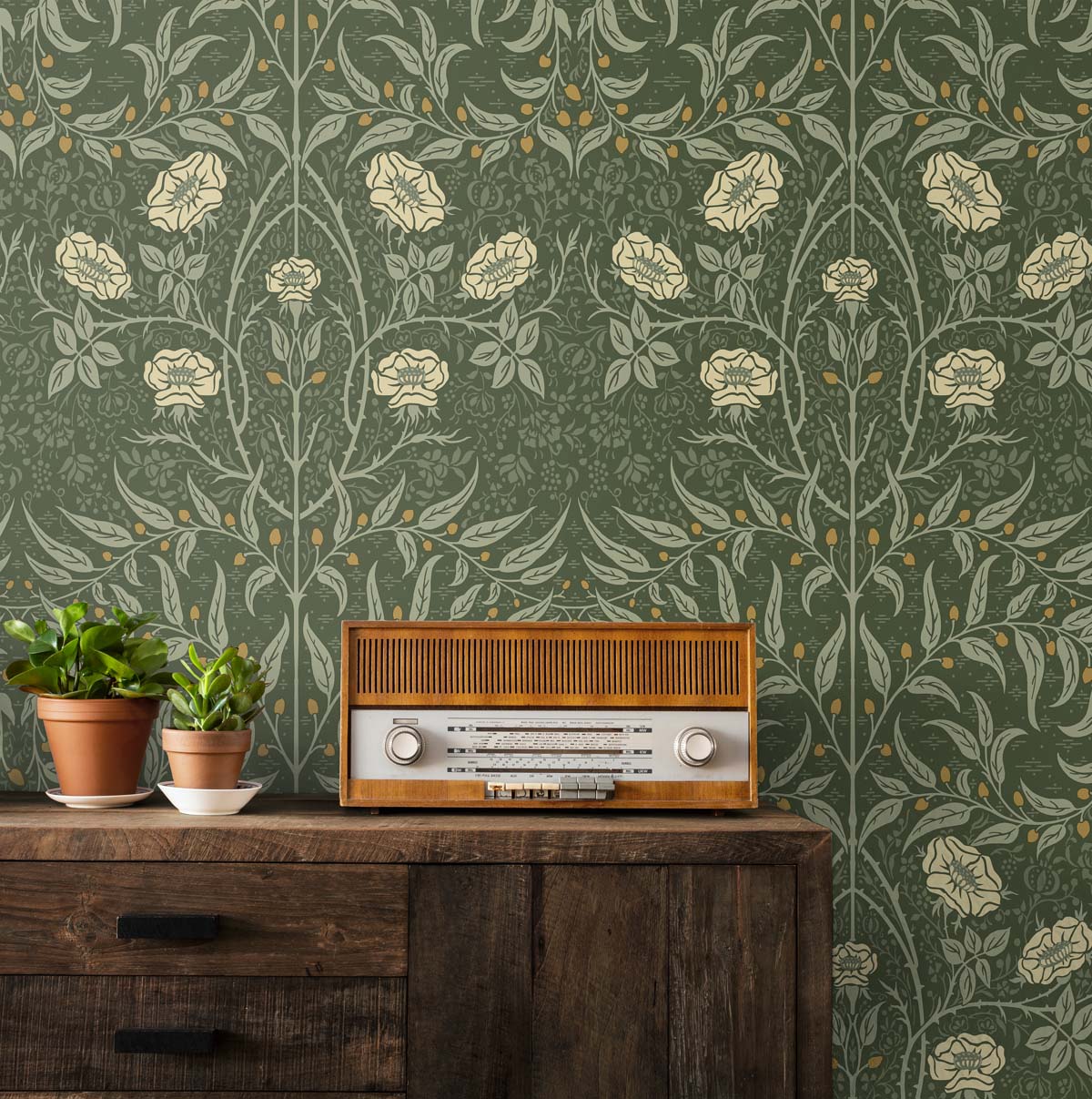 Vintage radio on a wooden cabinet against a wall decorated with Green Drawn Floral Peel & Stick Casa Mia Wallcovering.