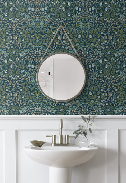 Bathroom with a round mirror and wall decorated with Blue & Green Victorian Floral Peel & Stick Casa Mia Wallcovering.