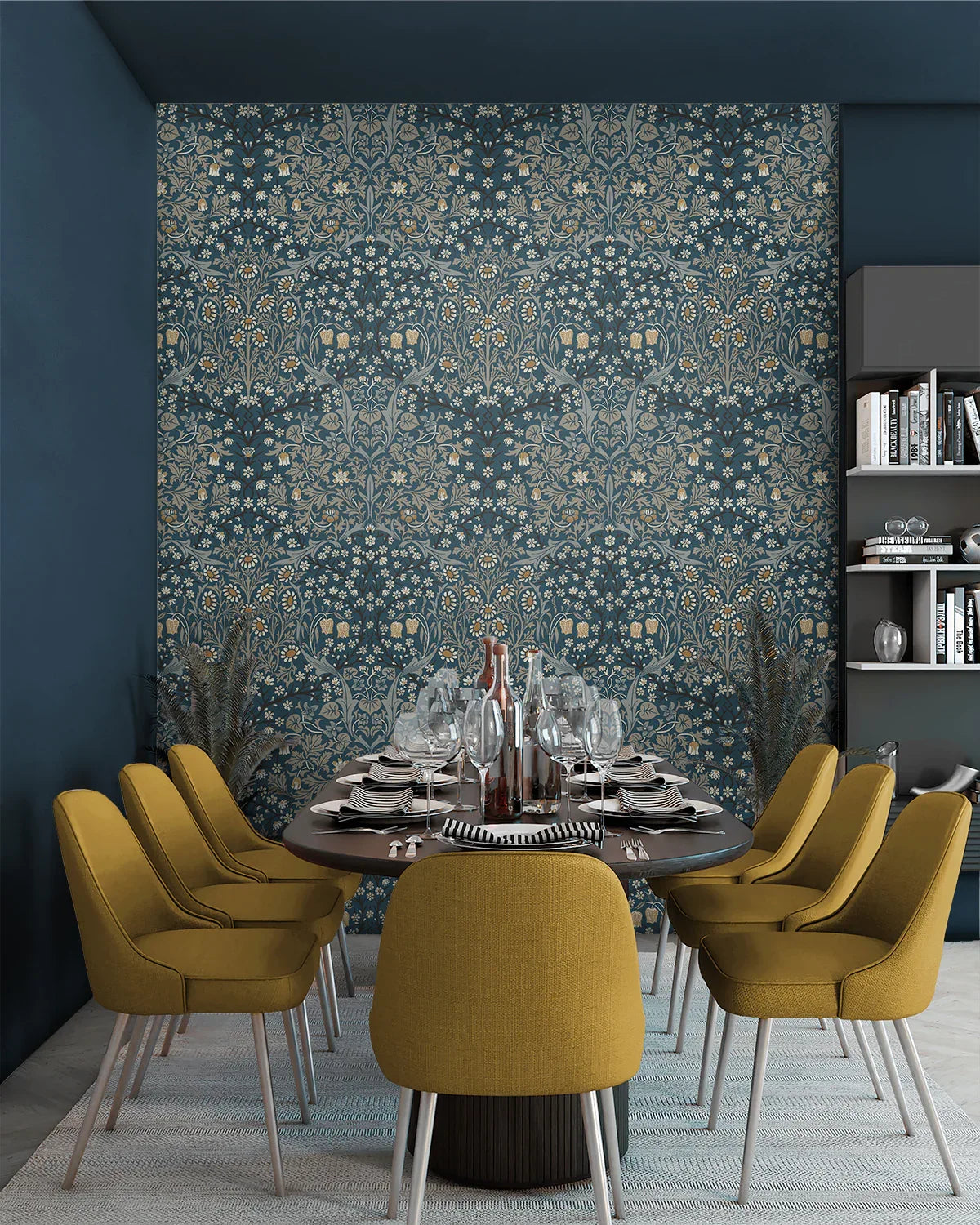Dining room with mustard yellow chairs, set table, dark blue walls, and Victorian Floral Peel Stick wallpaper accent.