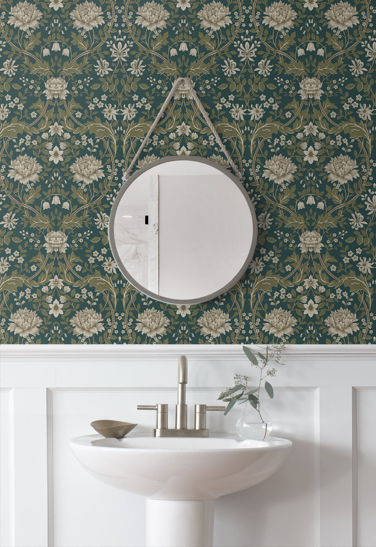 Round mirror on a wall decorated with Teal Woodbine Trail Peel & Stick Casa Mia Wallcovering and a sink below.