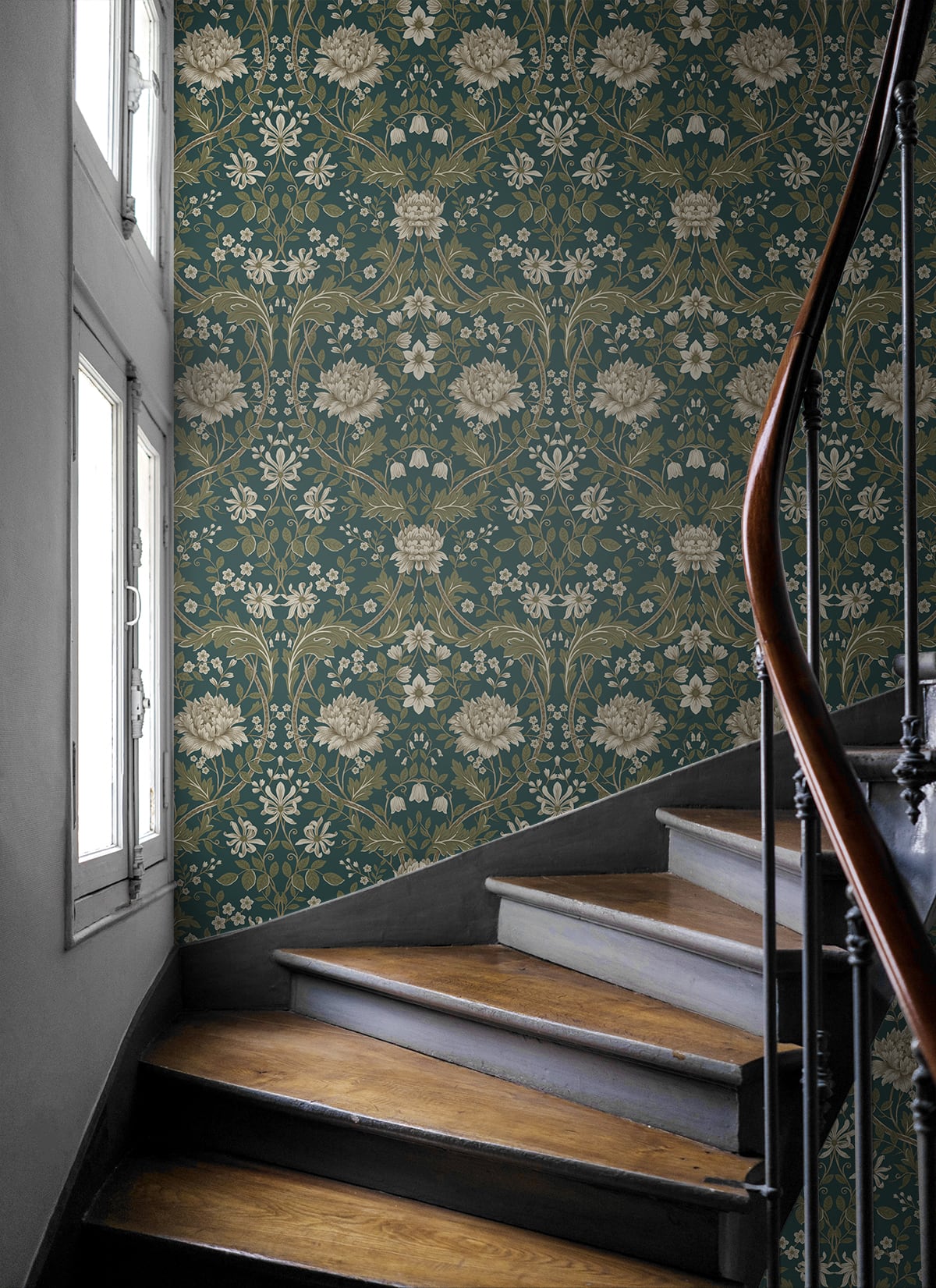 Staircase with wooden steps and a wall decorated with Teal Woodbine Trail Peel & Stick Casa Mia Wallcovering.
