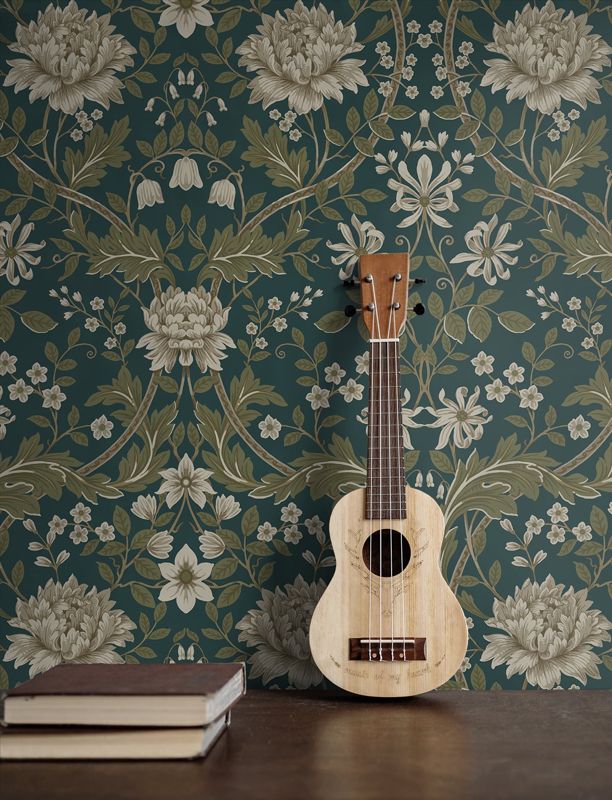Wooden ukulele against a floral wallpapered wall decorated with Teal Woodbine Trail Peel & Stick Casa Mia Wallcovering and books on a surface.
