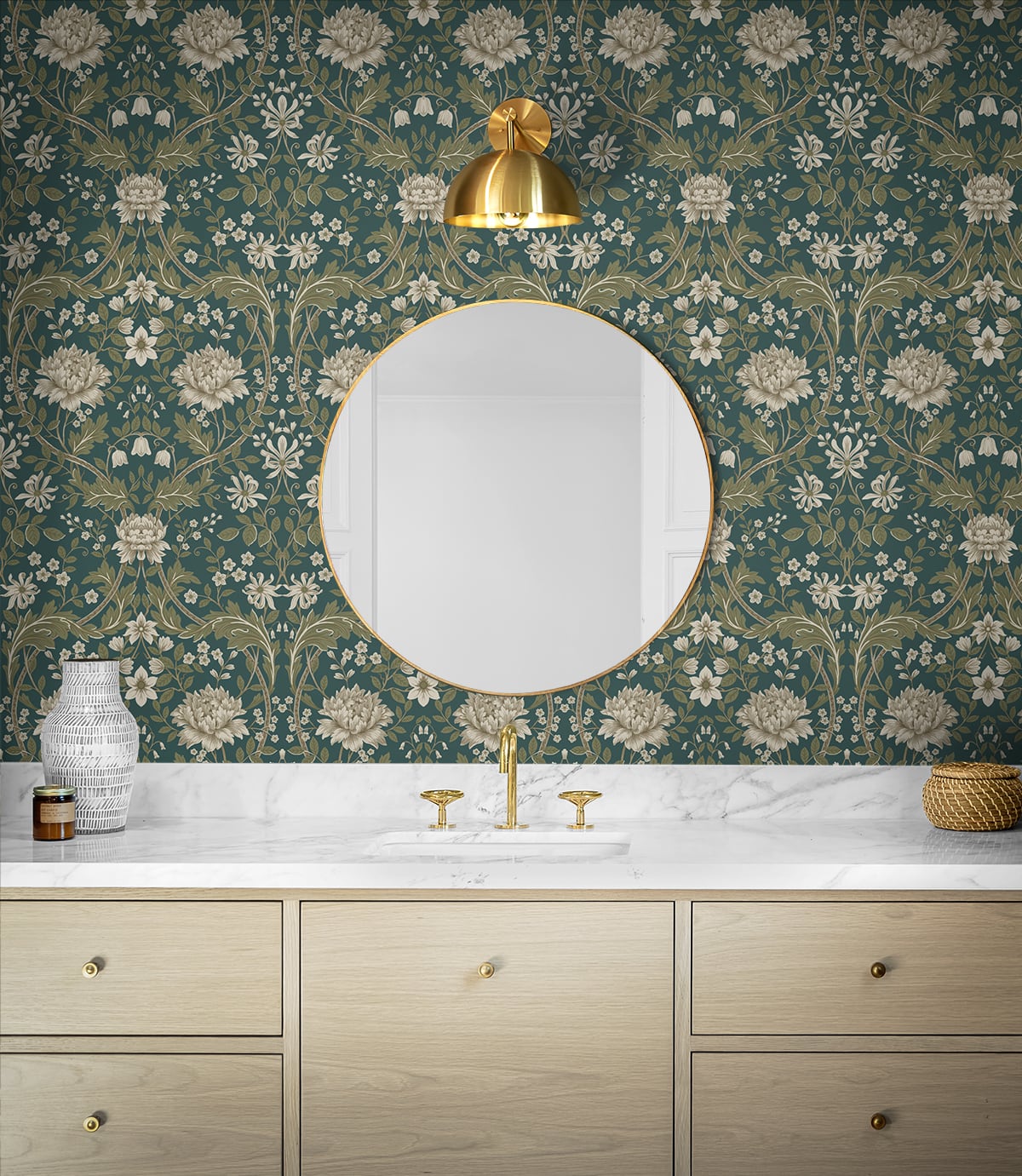 Bathroom with wall decorated with Teal Woodbine Trail Peel & Stick
Casa Mia Wallcovering, round mirror, and wooden vanity.