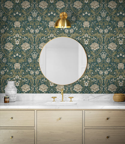 Bathroom with wall decorated with Teal Woodbine Trail Peel & Stick
Casa Mia Wallcovering, round mirror, and wooden vanity.