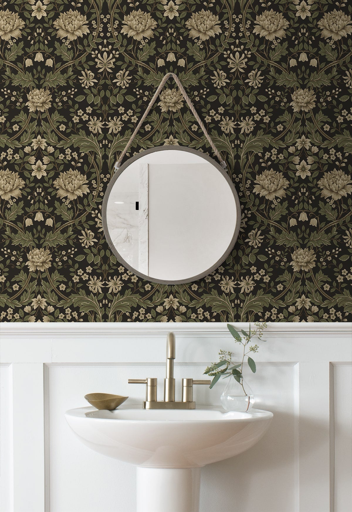 Round mirror on a wall decorated with Brown Woodbine Trail Peel & Stick Casa Mia Wallcovering and a sink below.