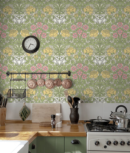 Kitchen wall decorated with Multicolored Antique Rose Peel & Stick Casa Mia Wallcovering, wooden countertops, and stainless-steel appliances.
