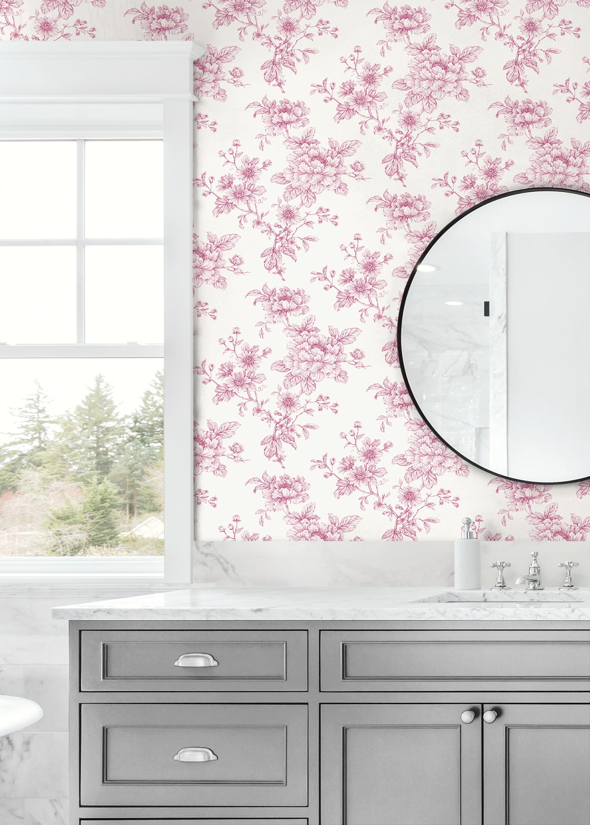 Bathroom wall decorated with Pink Cherished Rose Peel & Stick Casa Mia Wallcovering, gray vanity, and round mirror.