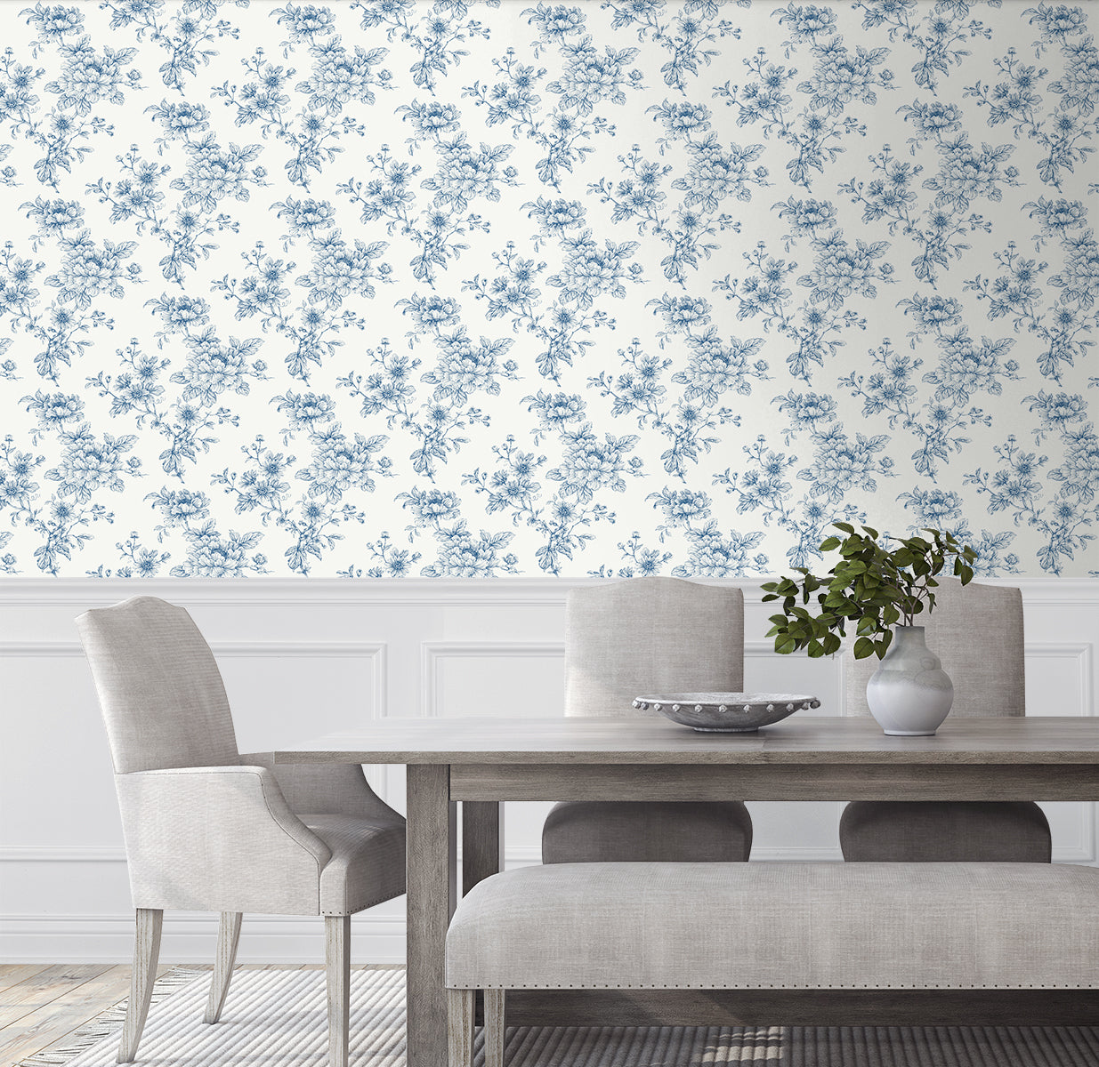 Dining wall decorated with Blue Cherished Rose Peel & Stick Casa Mia Wallcovering, wooden table, and gray chairs.