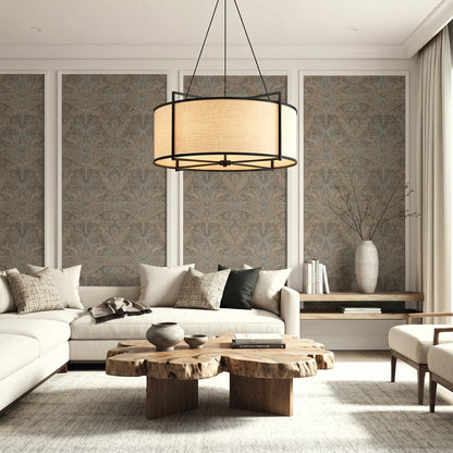 Modern living room with neutral sofas, a round chandelier, and Old Damask Wallpaper behind wooden coffee tables.