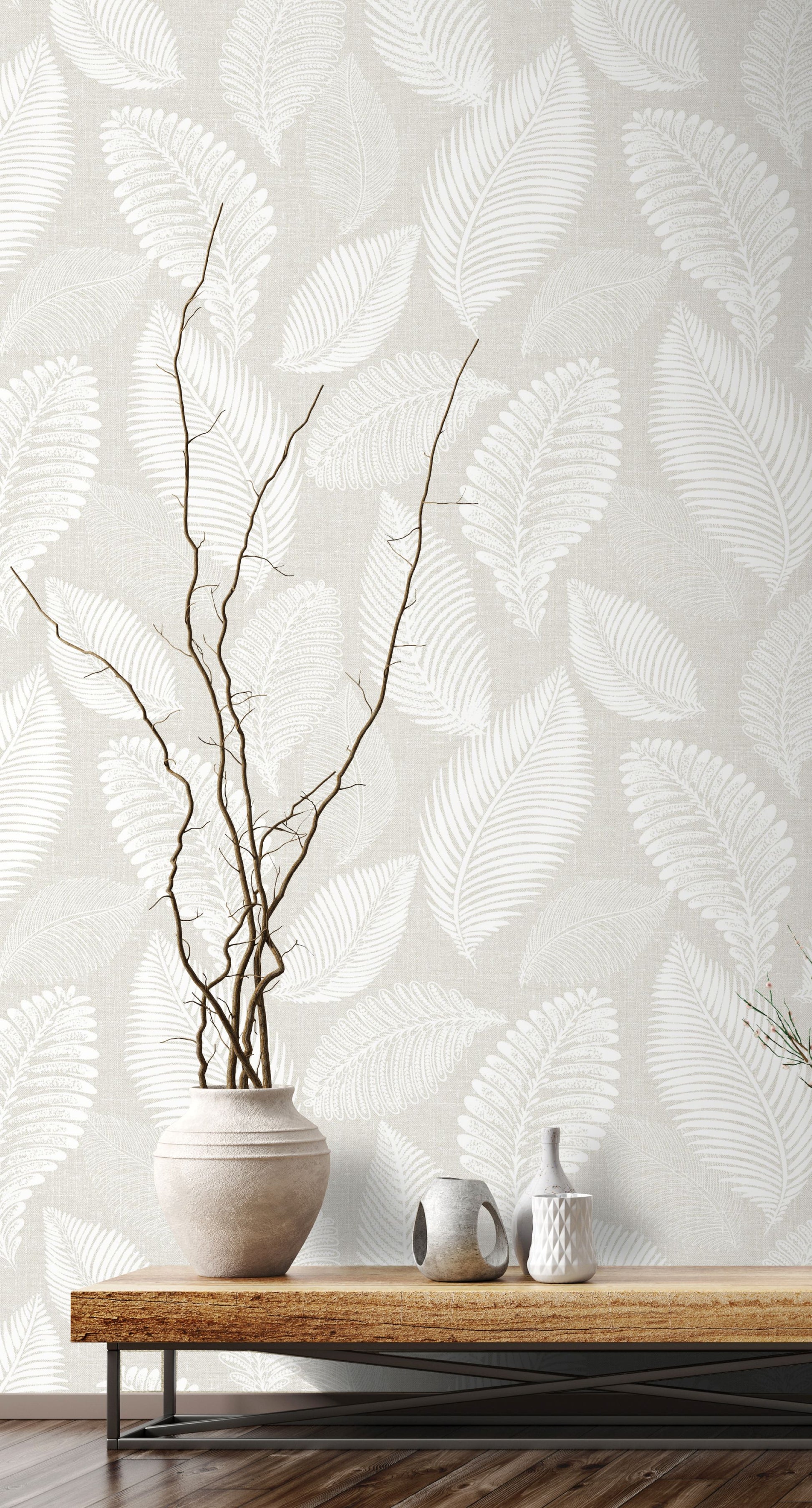White/Off White Scattered Leaves Wallpaper with a wooden table and decorative items.