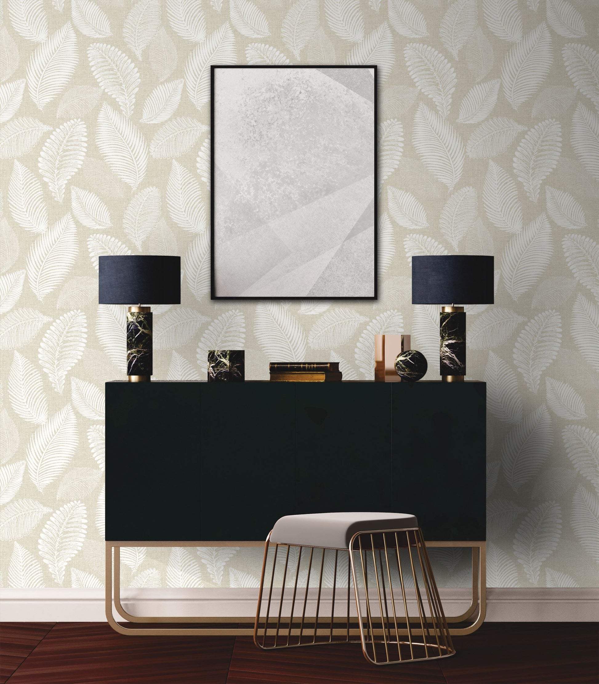 Modern interior design with a black console table, lamps, and decorative items against a wall decorated with Sand Cream Scattered Leaves Wallpaper.
