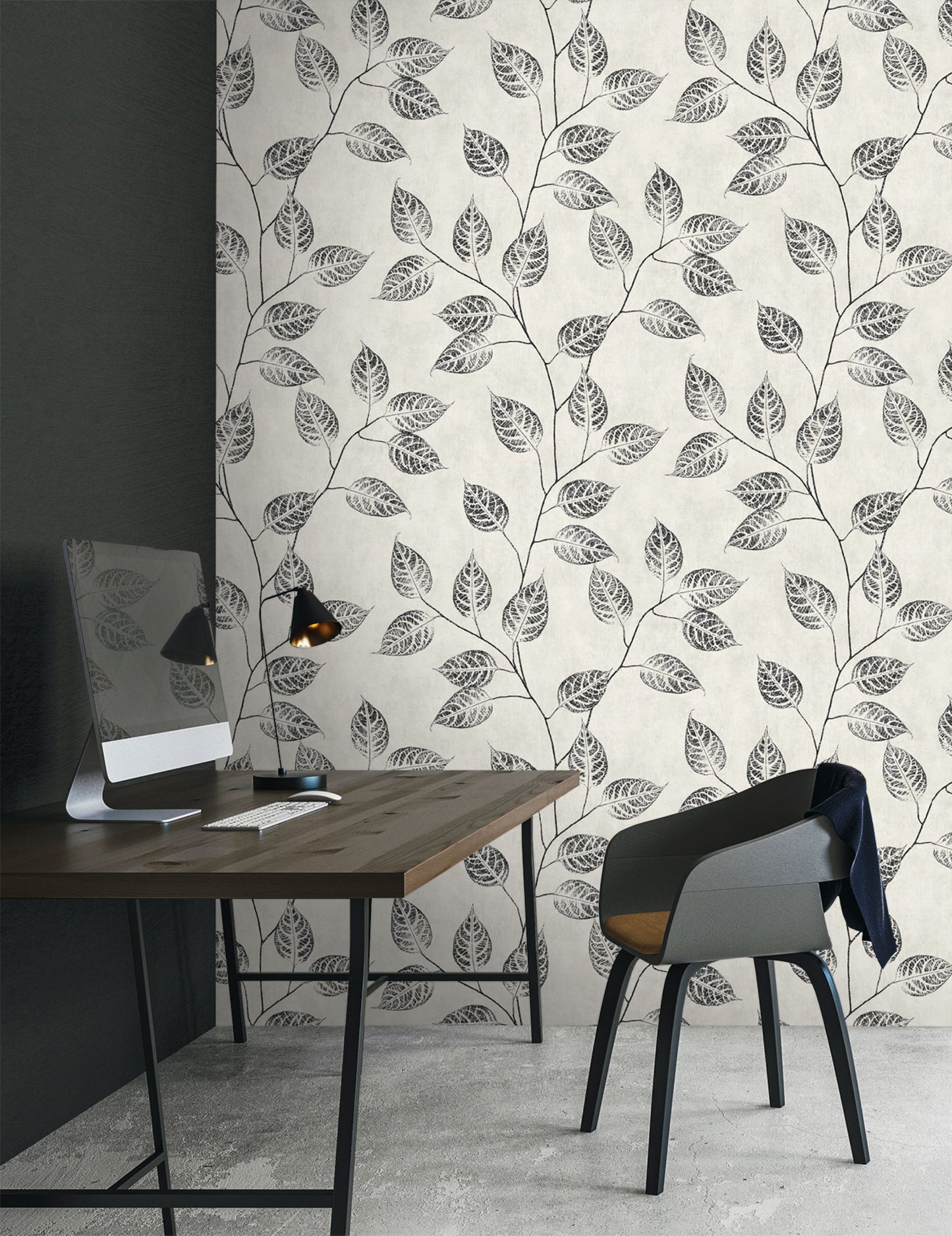Modern office space with a desk and chair against a wall decorated with Black & Beige Branch Of Leaves Wallpaper.
