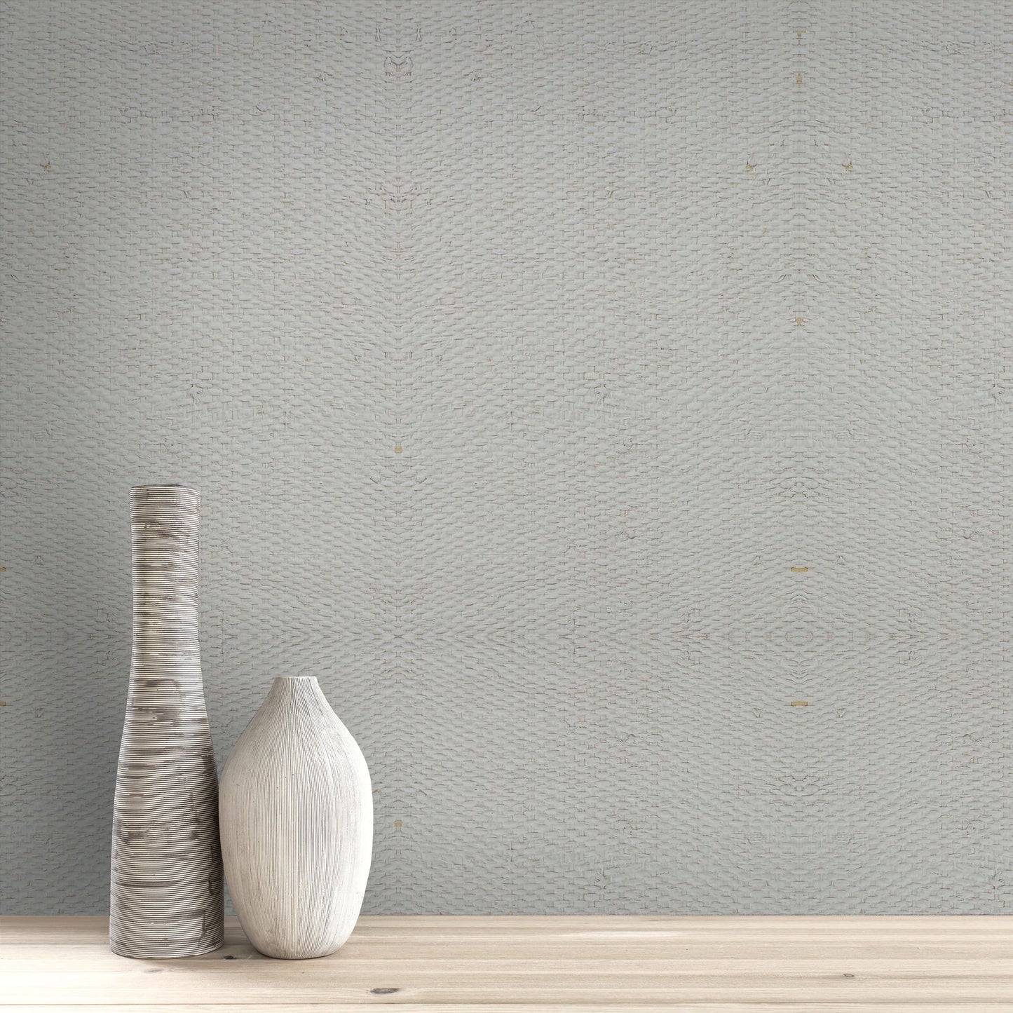 Two wooden vases on a wooden surface with a textured Gray & White/Off White Raffia Texture Grasscloth & Naturals wall in the background.
