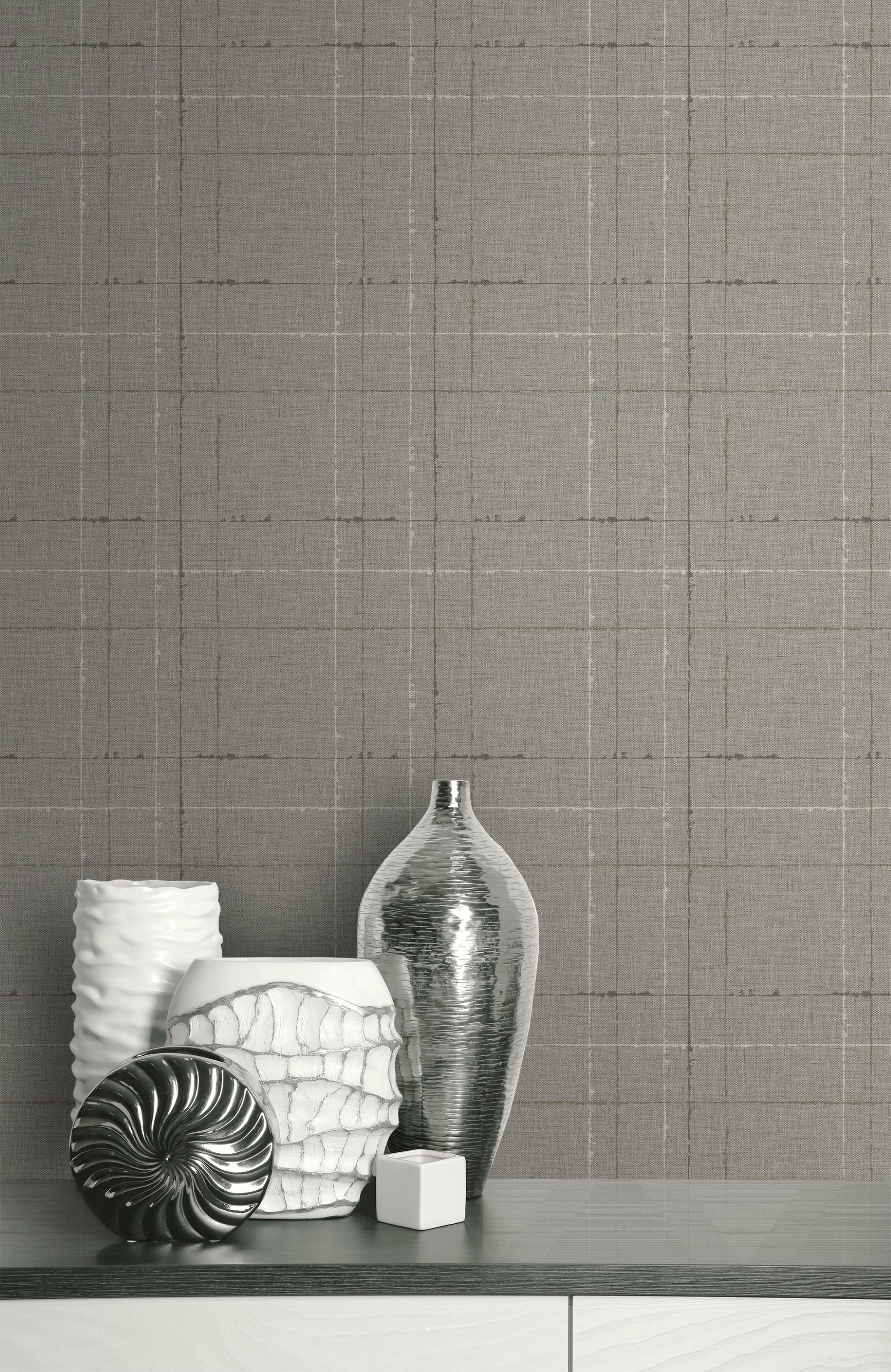 Decorative vases on a shelf against a wall decorated with Ash Gray Plaid Texture Commercial & Vinyl.
