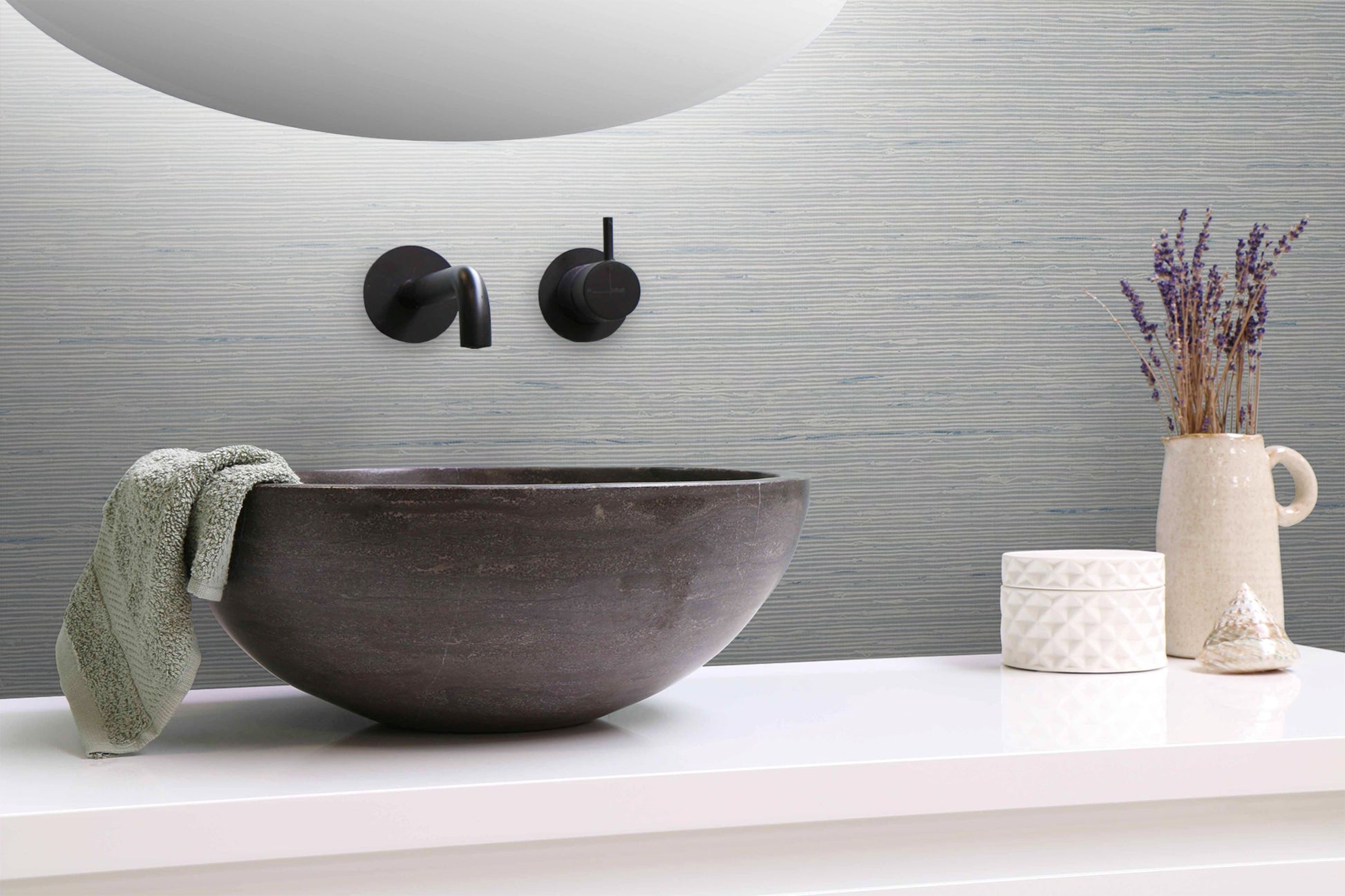 Bathroom sink with faucet, towel, and decorative items on a Silver Natural Weave Commercial & Vinyl background.