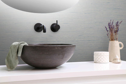 Bathroom sink with faucet, towel, and decorative items on a Silver Natural Weave Commercial & Vinyl background.