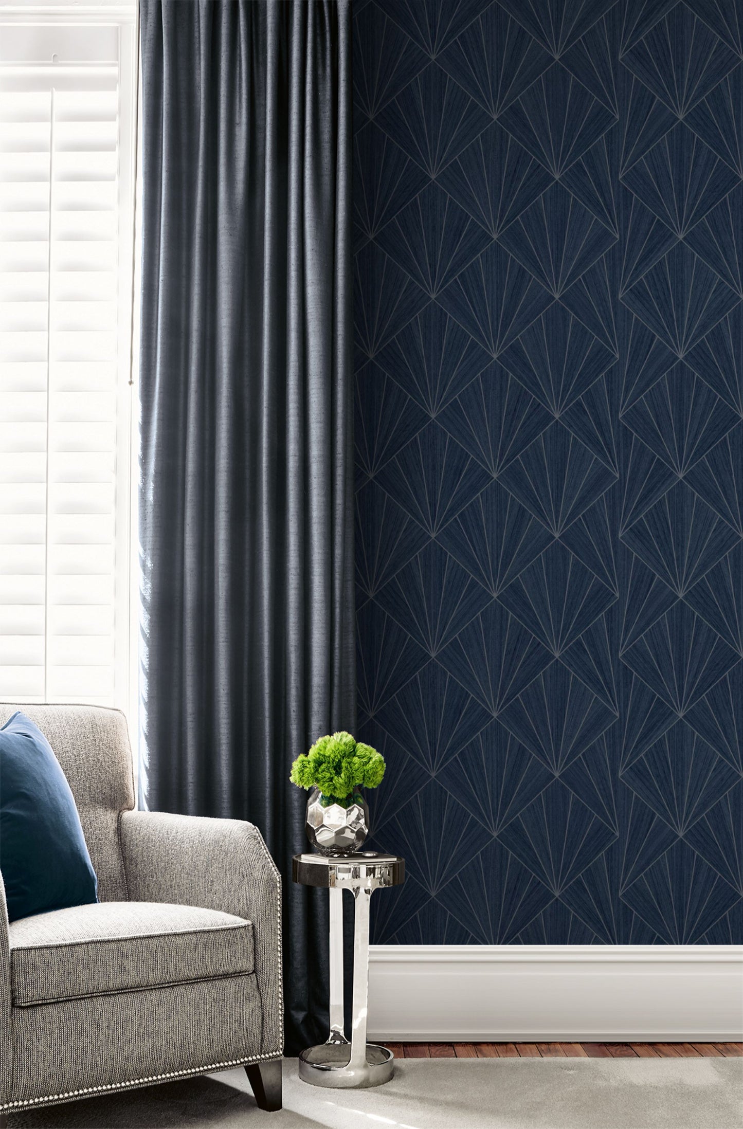Ink Blue Art Deco Geo Commercial & Vinyl wallpaper with a gray armchair and decorative plant.