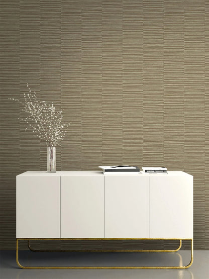 Minimalist white sideboard with gold legs, decor, and flowers against Industrial Grasscloth Stripe Commercial Vinyl.