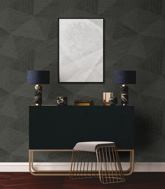 Modern interior design with a black console table, lamps, and abstract art on a wall decorated with Charcoal Geometric Fibers Triangles Commercial & Vinyl.
