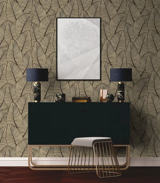 Modern sideboard with two lamps, decor, and art on Modern Metallic Leaf Peel Stick wallpaper, stool in front.