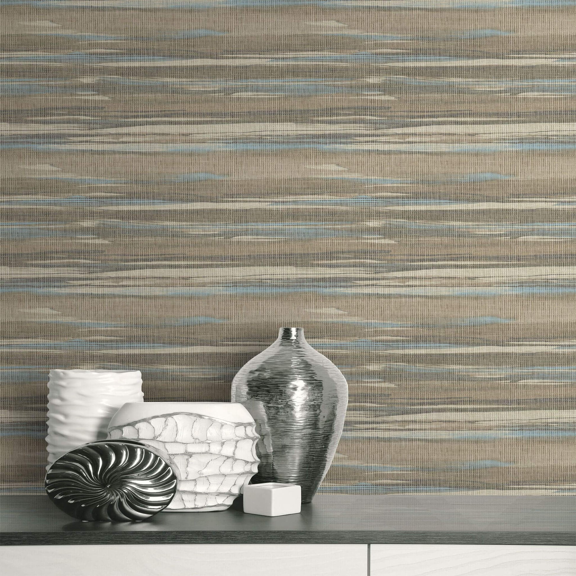 Decorative vases against a patterned Brown & Bleu Grasscloth Waves Wallpaper.