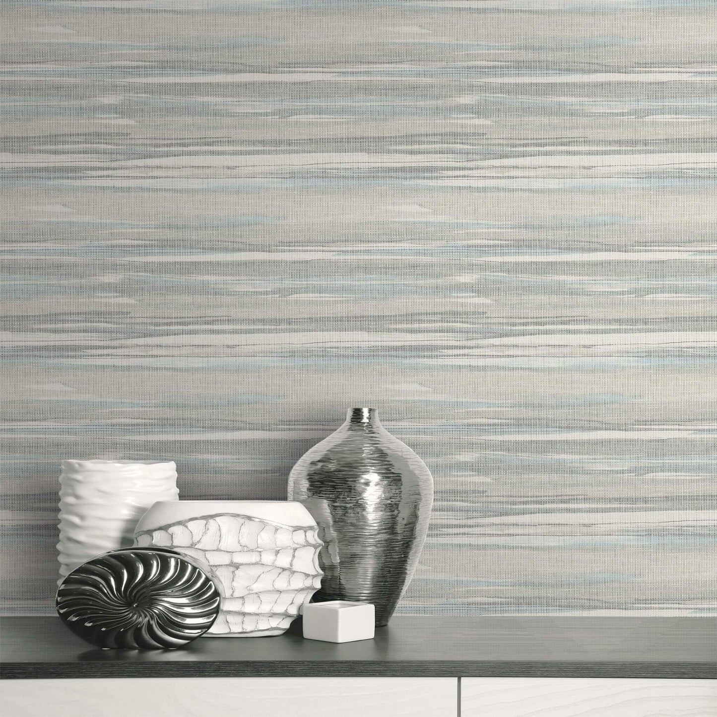 Decorative vases against a textured  Soft Gray & Sky Bleu Grasscloth Waves Wallpaper.
