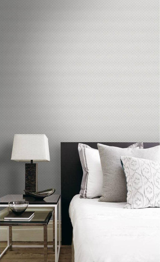 Modern bedroom with a black headboard, white bedding, and 3D Geometric Wallpaper for a stylish, textured look.